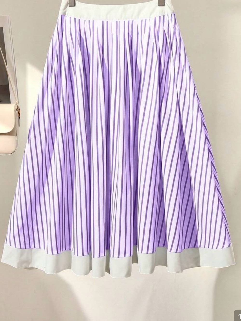 Purple and white vertical striped midi skirt and white waist band